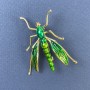 Broche insecto verde dorado