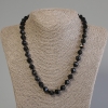 Collar de ónix negro facetado, diámetro de las cuentas 10x9 mm +-, longitud 50 cm +- con cierre