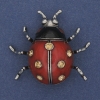 Broche-colgante Sol rojo esmalte, cristales amarillos, metal plateado 42×47 mm+